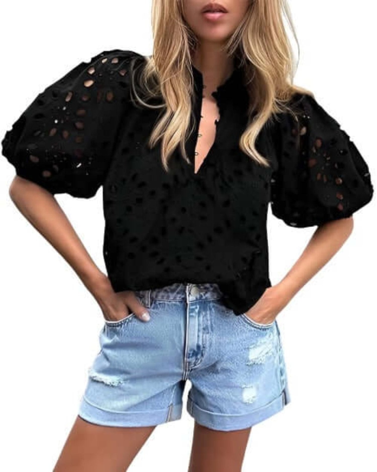 Black cotton blouse with floral lace and lantern sleeves.