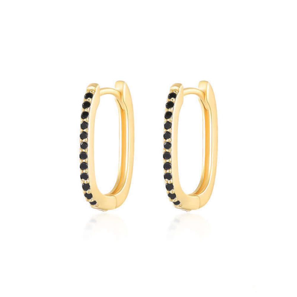 Elegant gold hoop earrings featuring a ribbed design and diamond accents