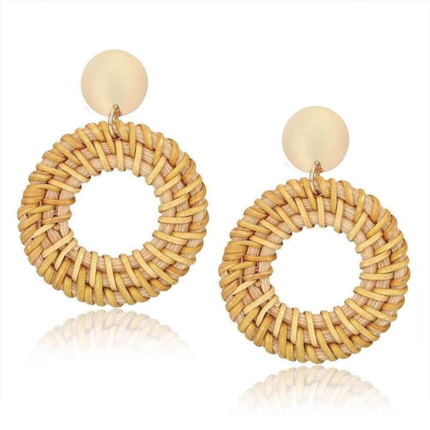 Handmade rattan earrings with intricate weaving.