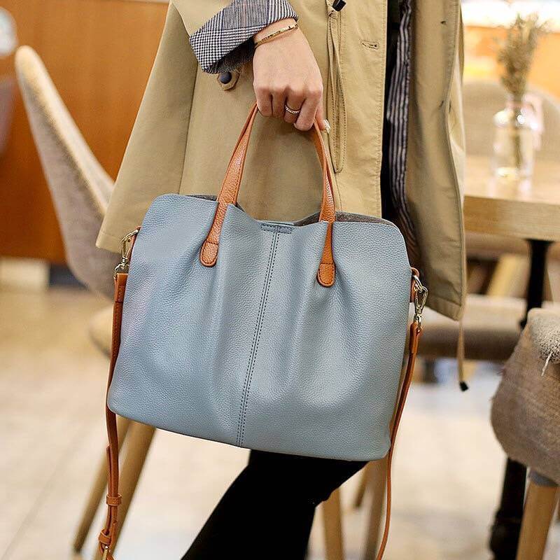 Leather travel handbag