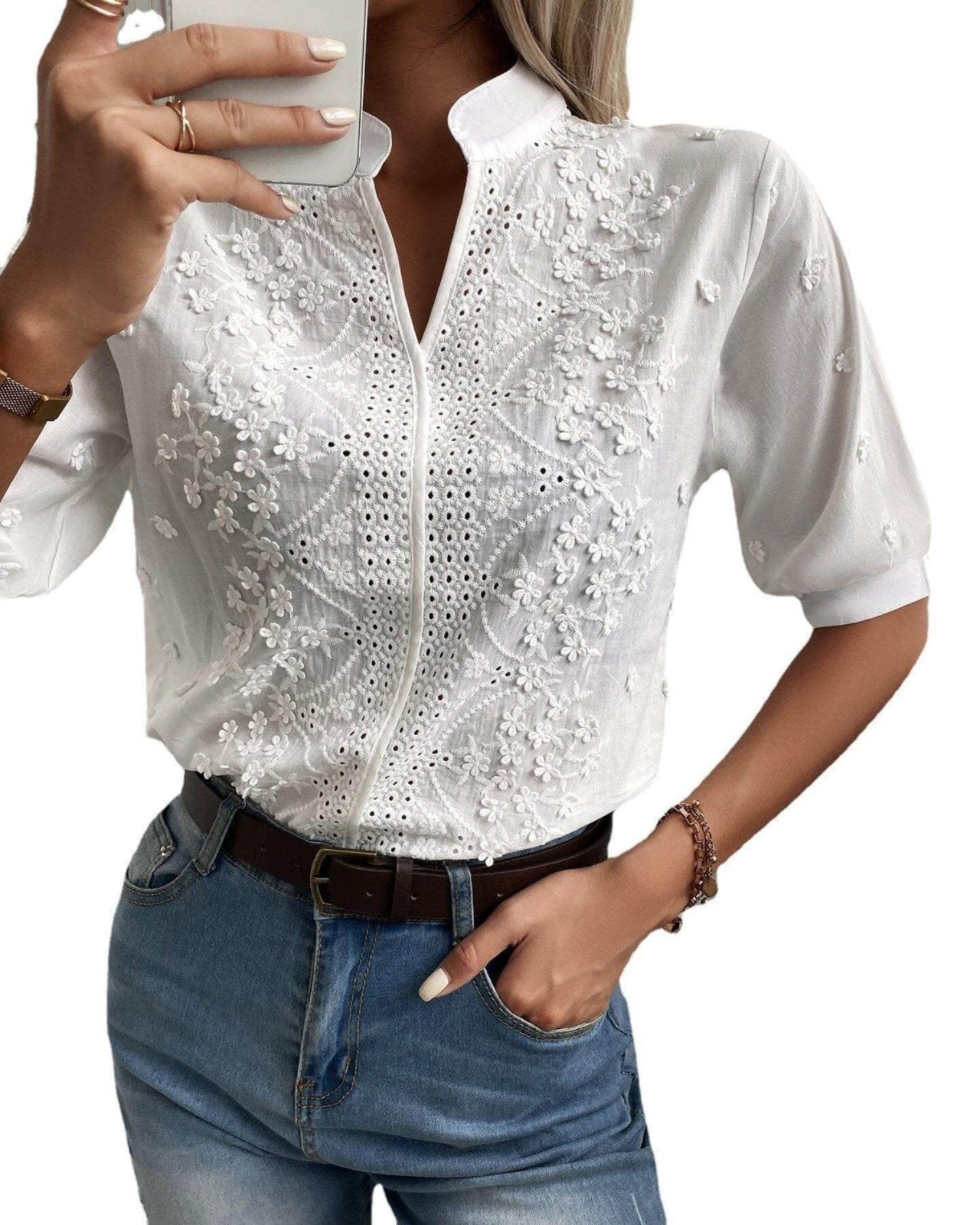 White lace blouse with short sleeves and loose fit