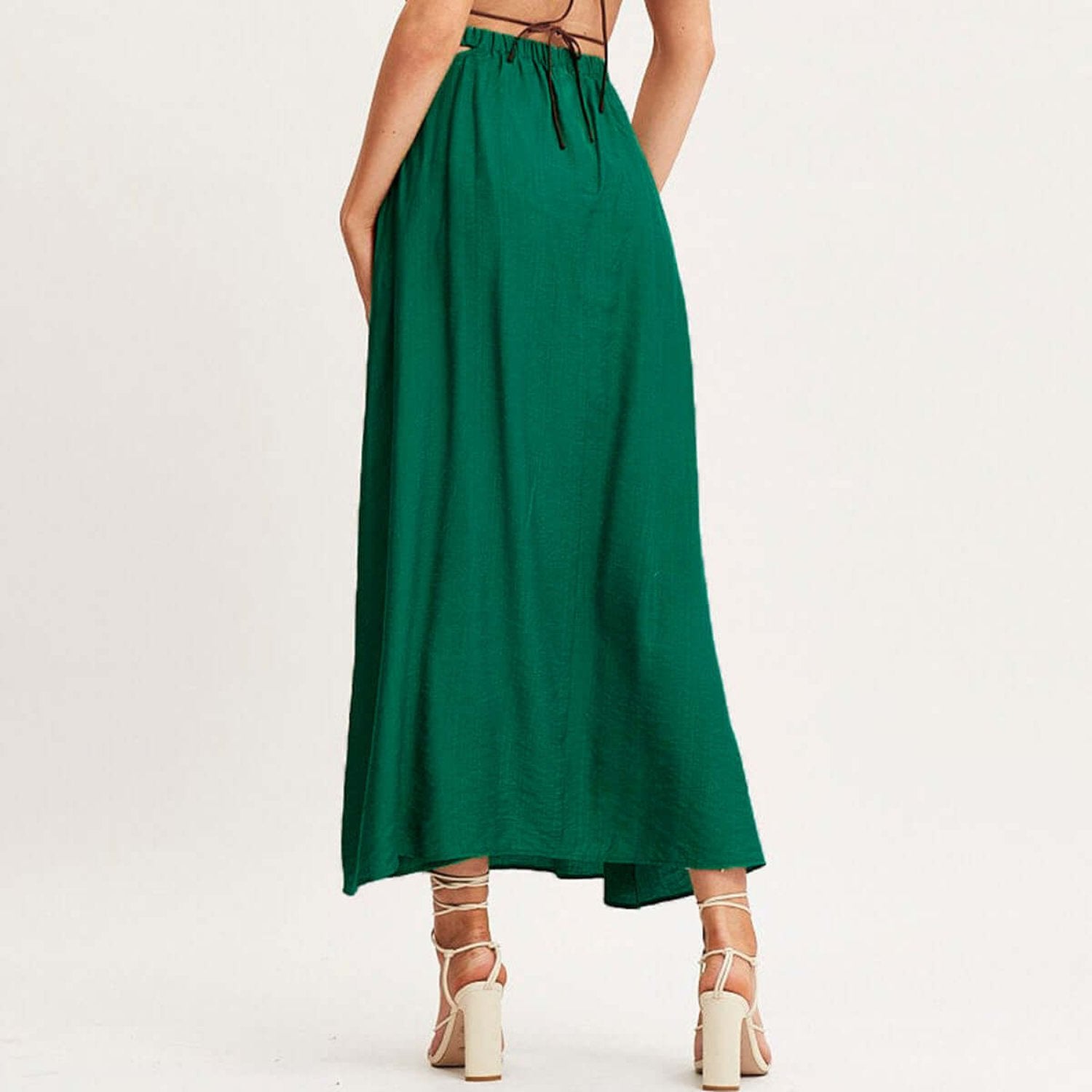 Dark green high waist skirt featuring a unique hollow-out detail